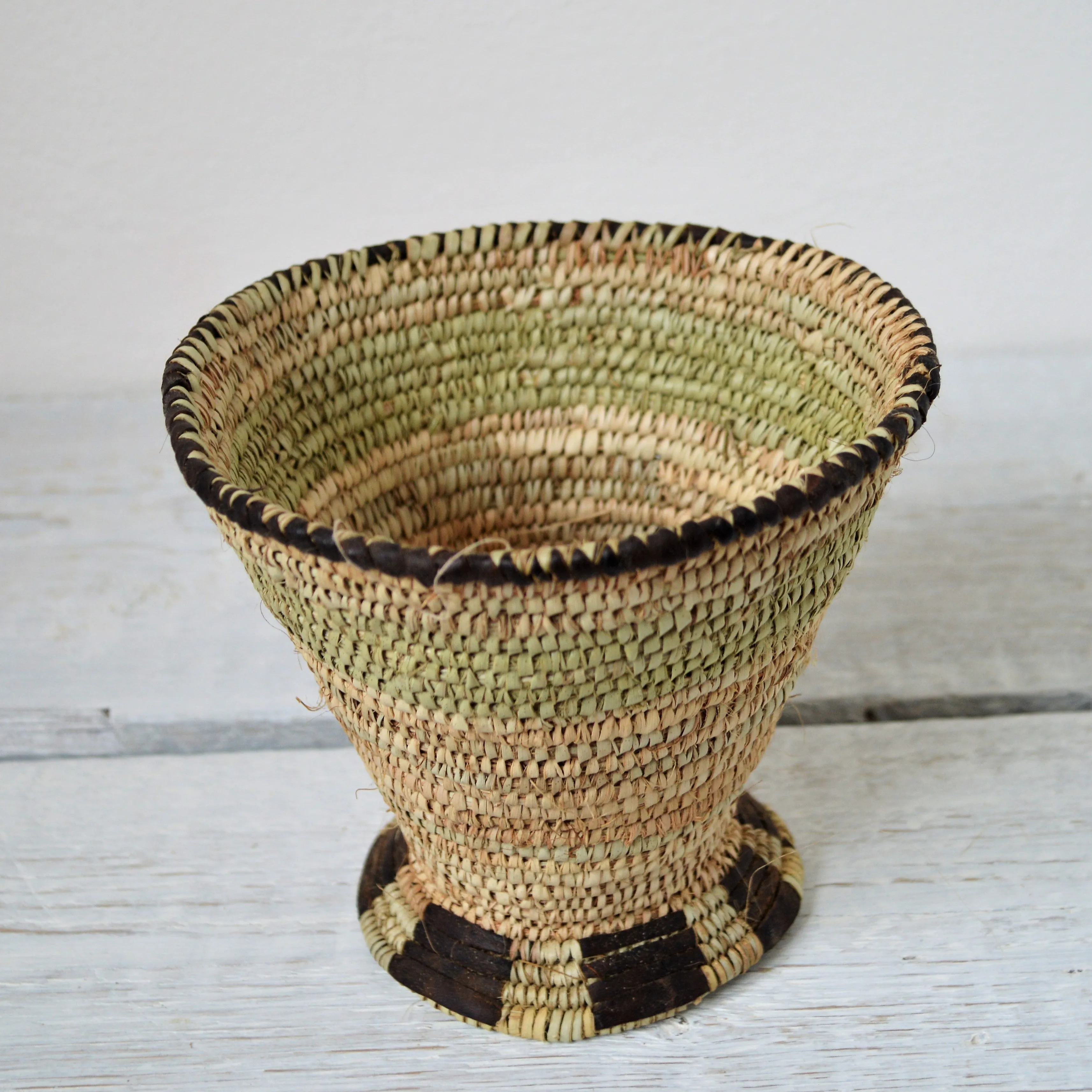 Woven rustic bowl with cup shape