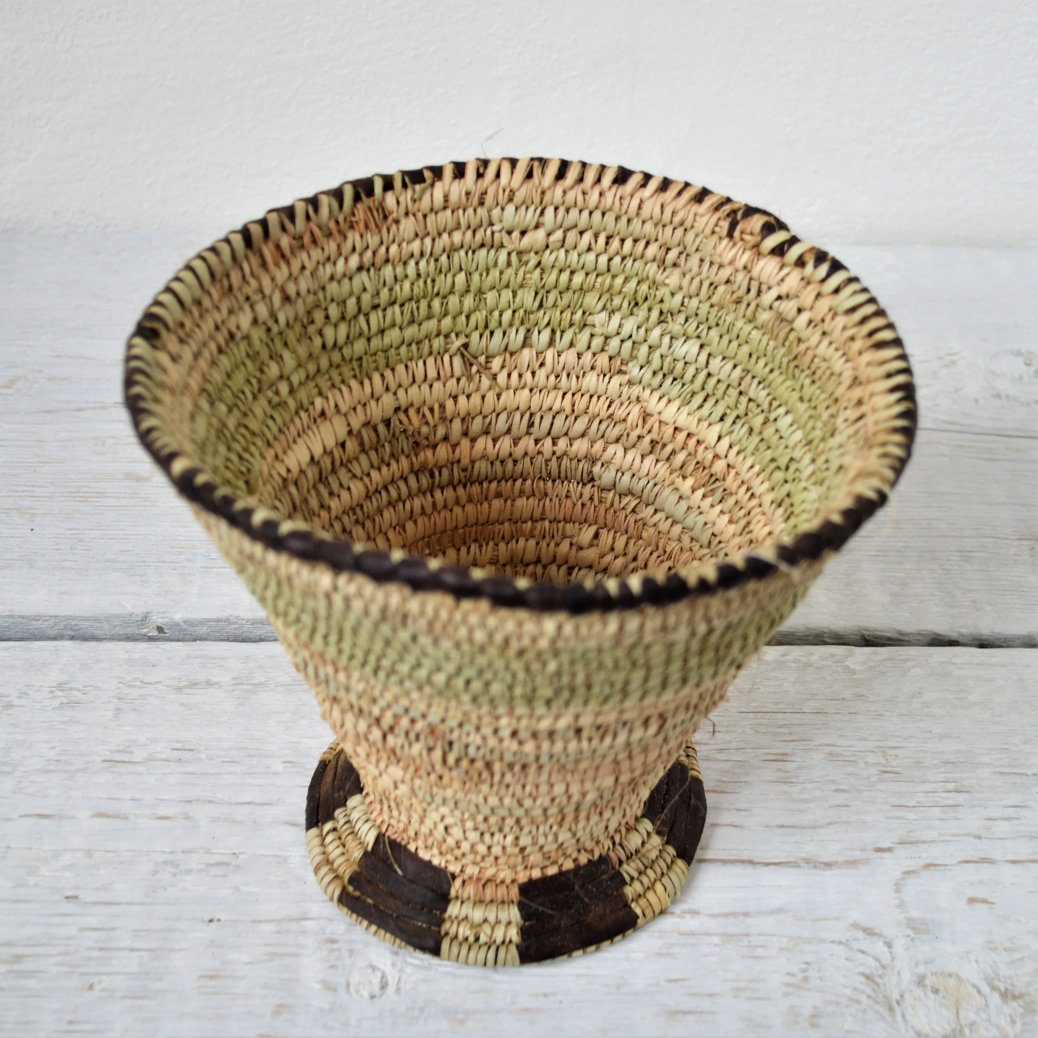 Woven rustic bowl with cup shape